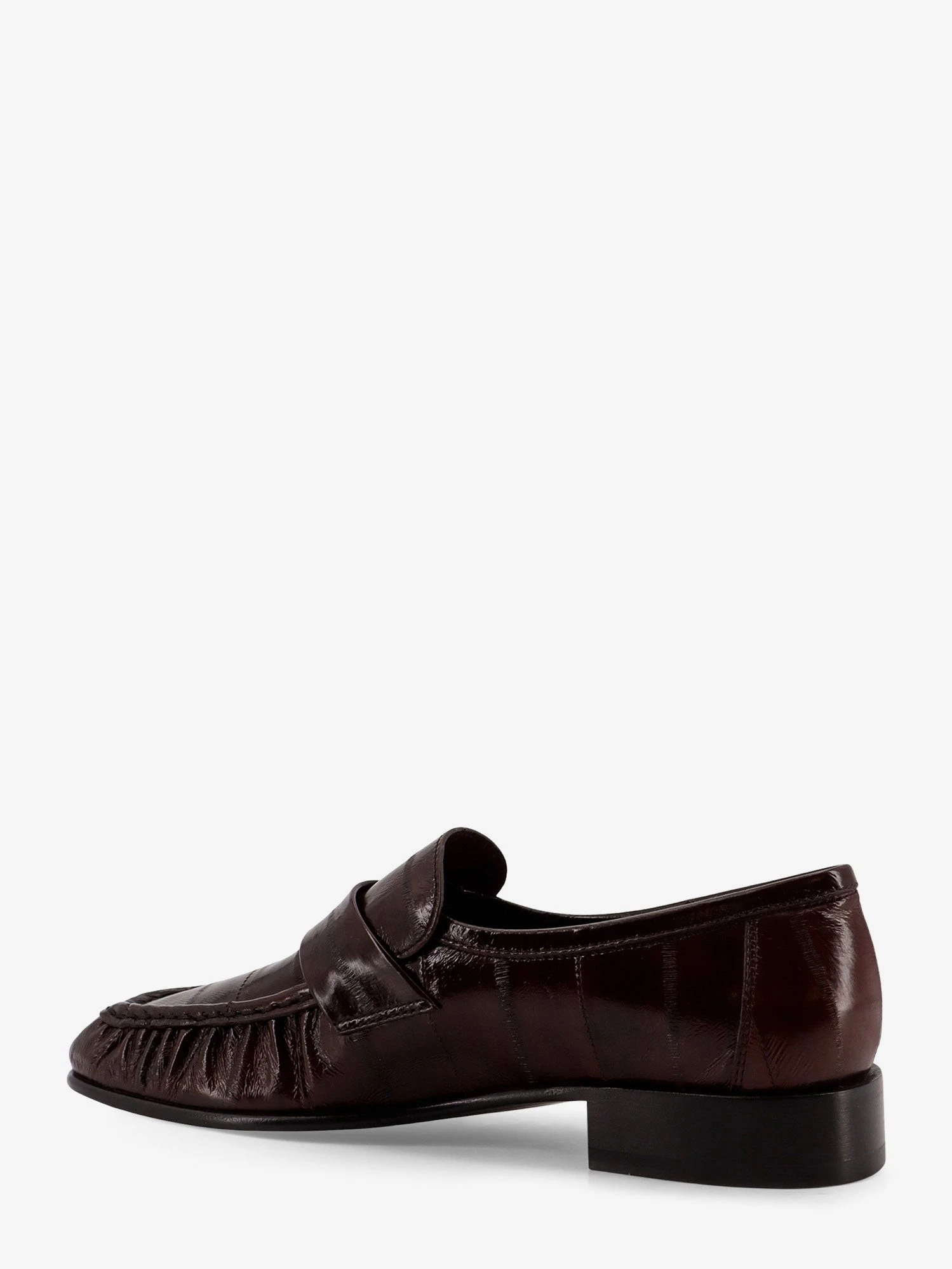 Shiny leather loafers.webp
