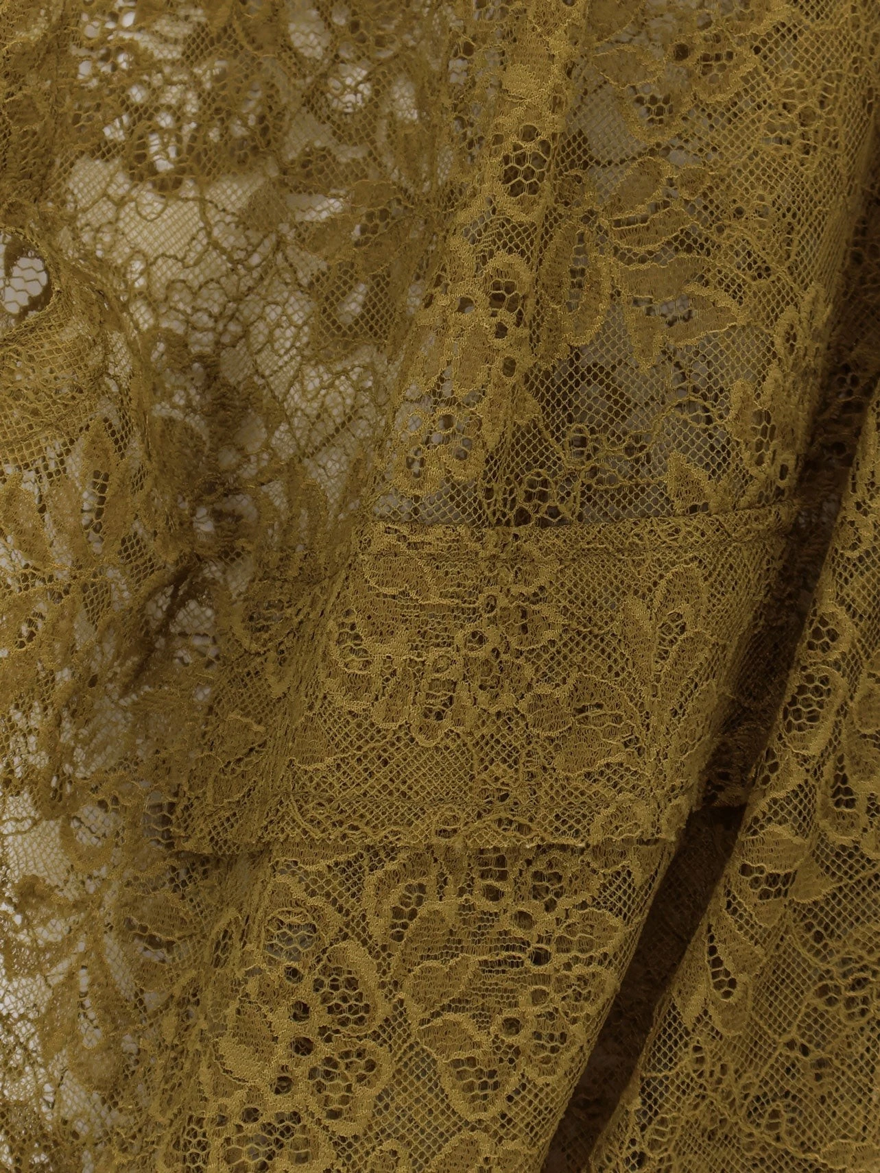 Sleeveless lace jacket.webp