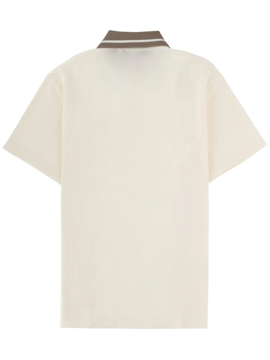 POLO CON PATCH LOGO.webp