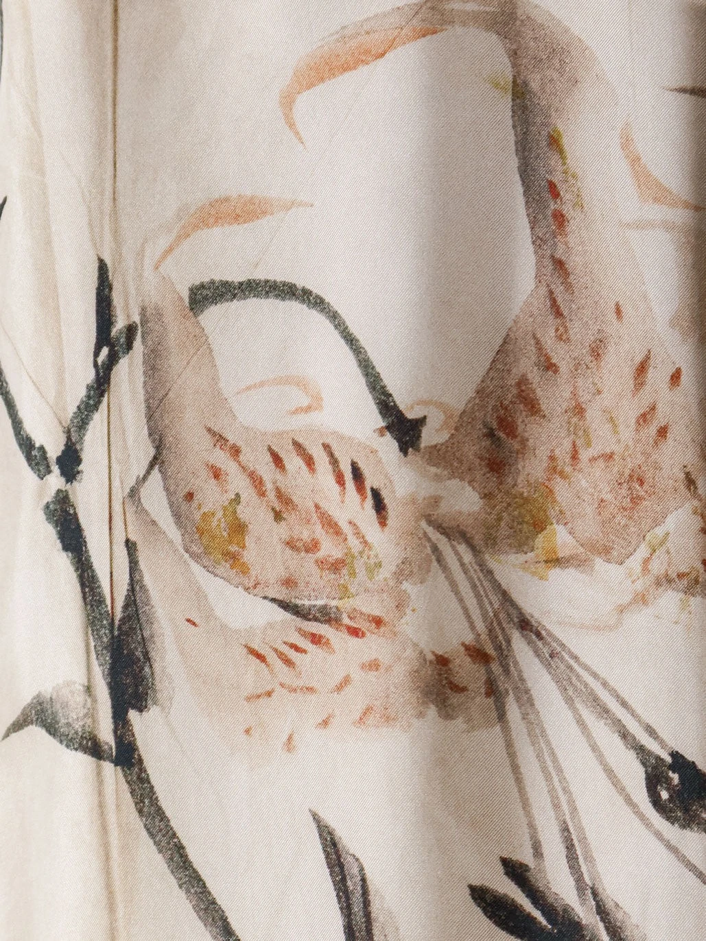 Silk trousers with floral print.webp