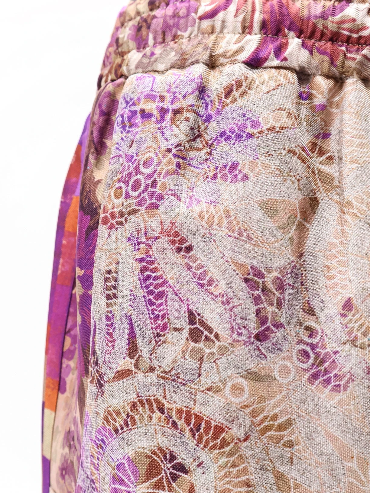 Silk trousers with mulitcolor print all-over.webp