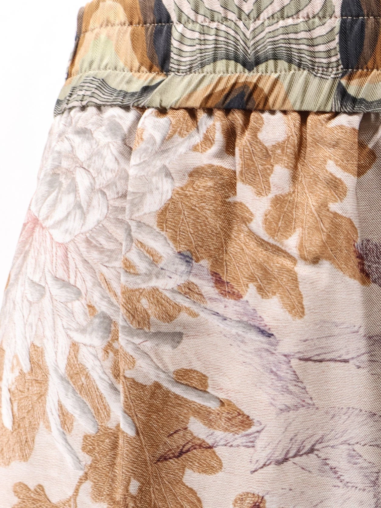 Silk trouser with all-over prints.webp