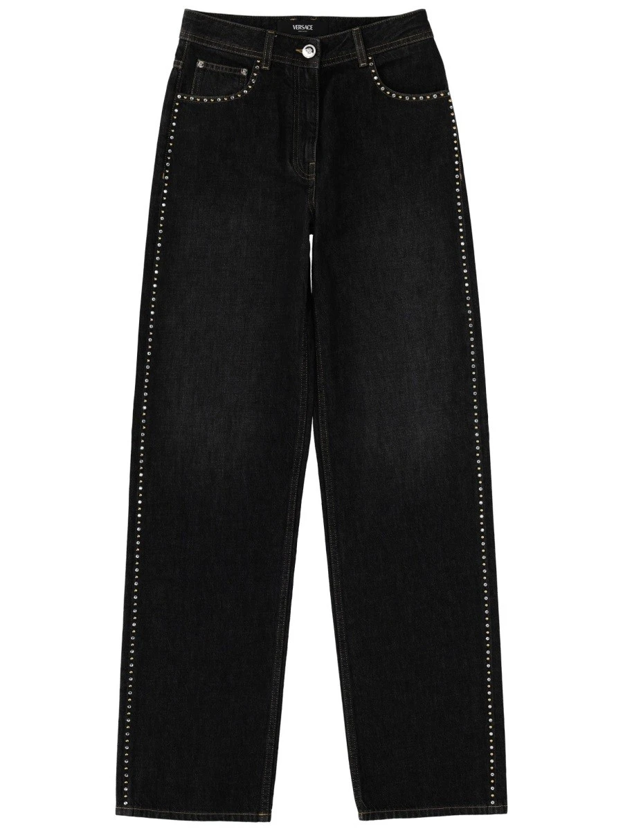 JEANS WITH STUDS AND CRYSTALS DECORATION.webp