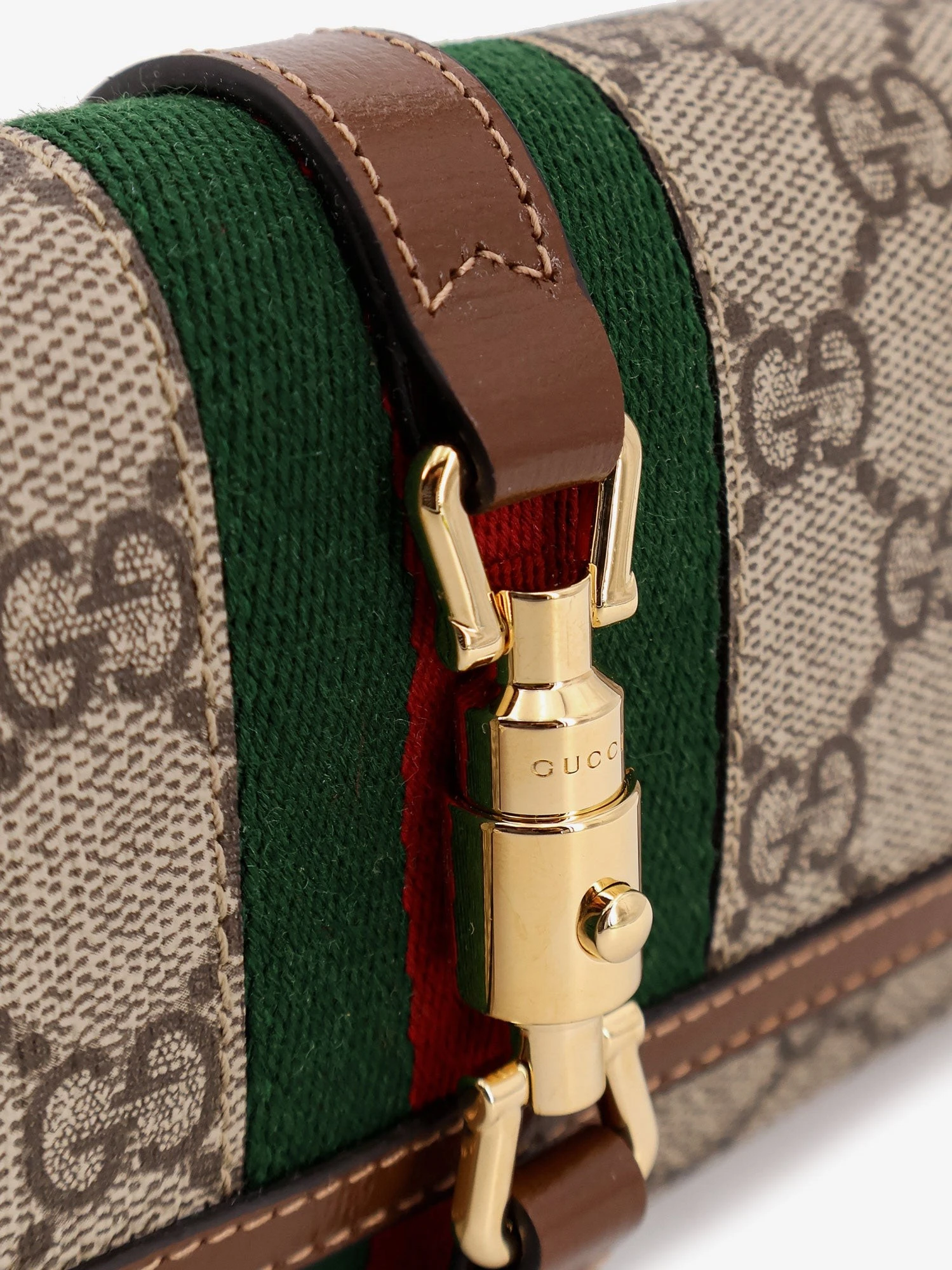 Jackie 1961 GG Supreme fabric and leather wallet with shoulder strap.webp