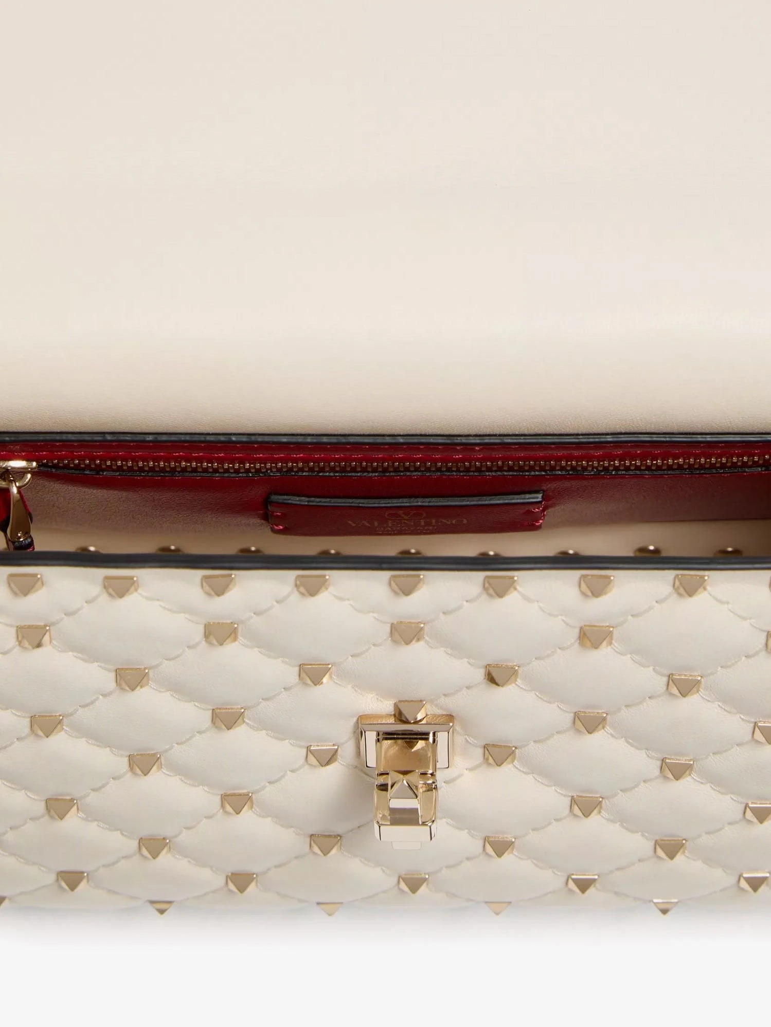 Rockstud Spike leather crossbody bag with iconic all-over studs.webp