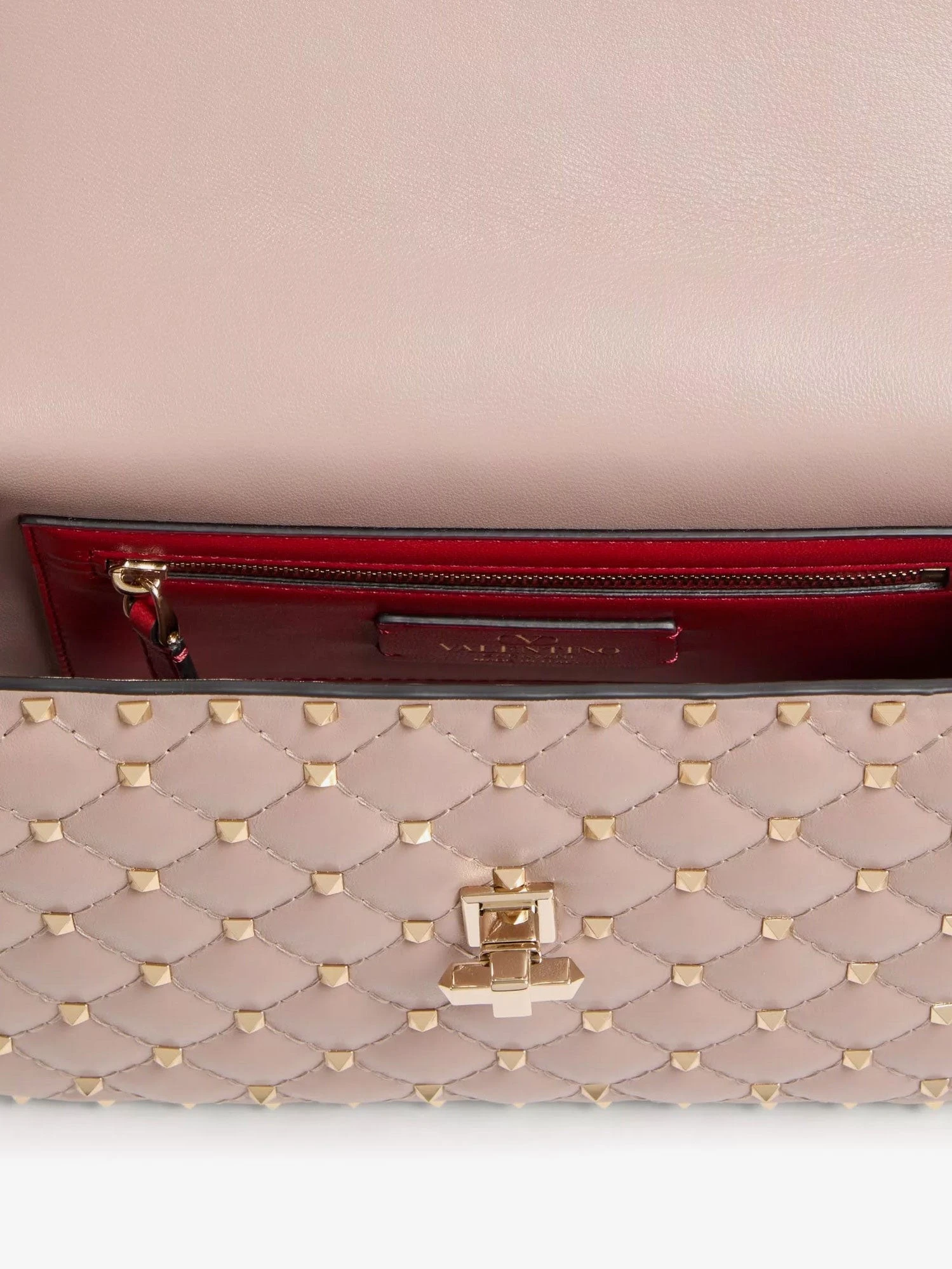 Rockstud Spike leather crossbody bag with iconic all-over studs.webp