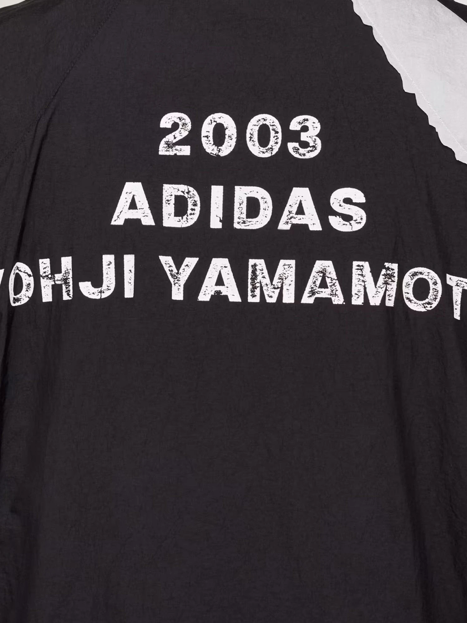 Water-repellent nylon jacket with front logo.webp