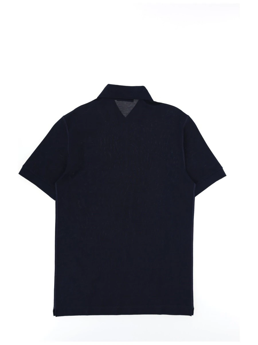 POLO CON PATCH LOGO.webp