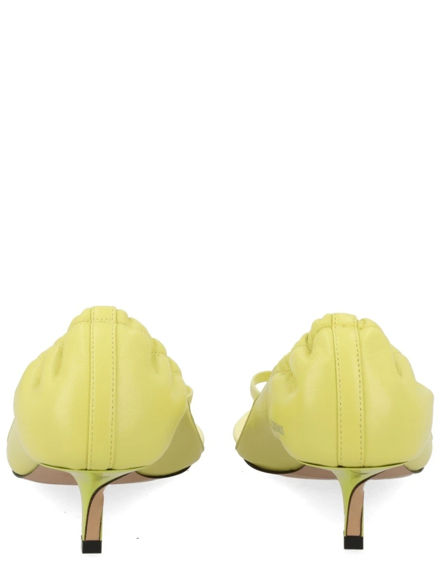 SANDALO CON TACCO.webp