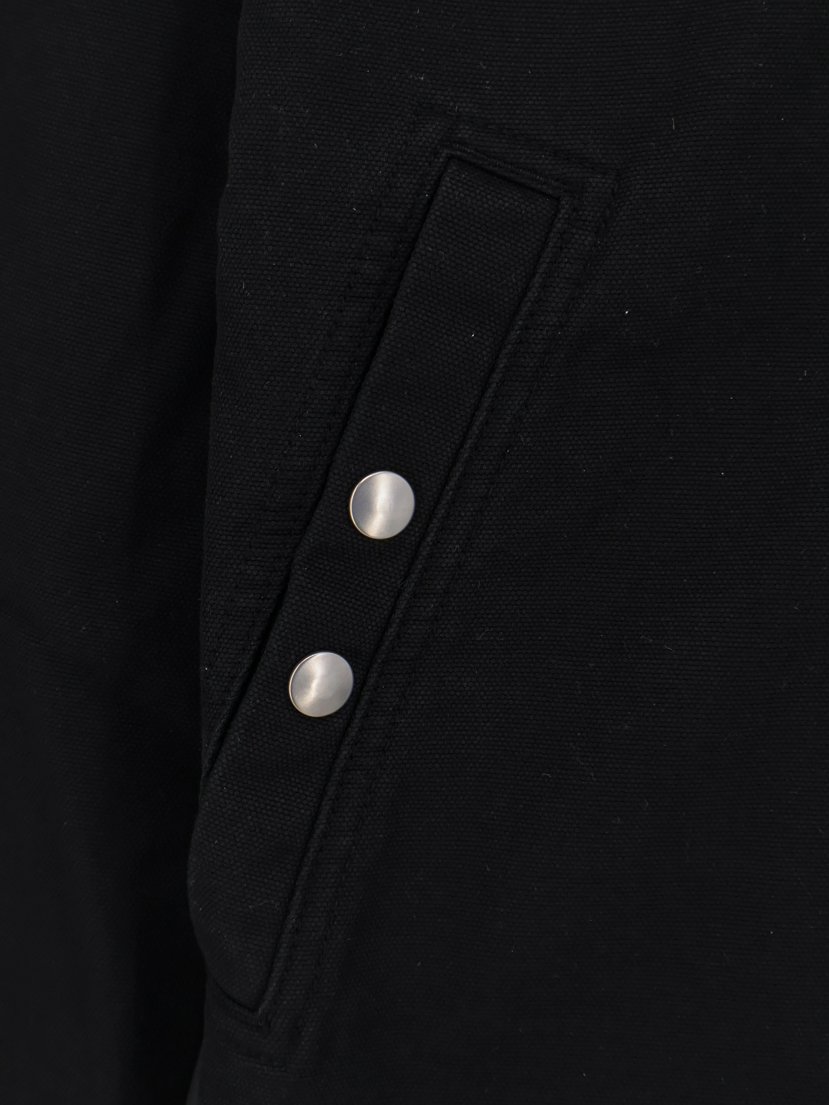 Black denim jacket.webp