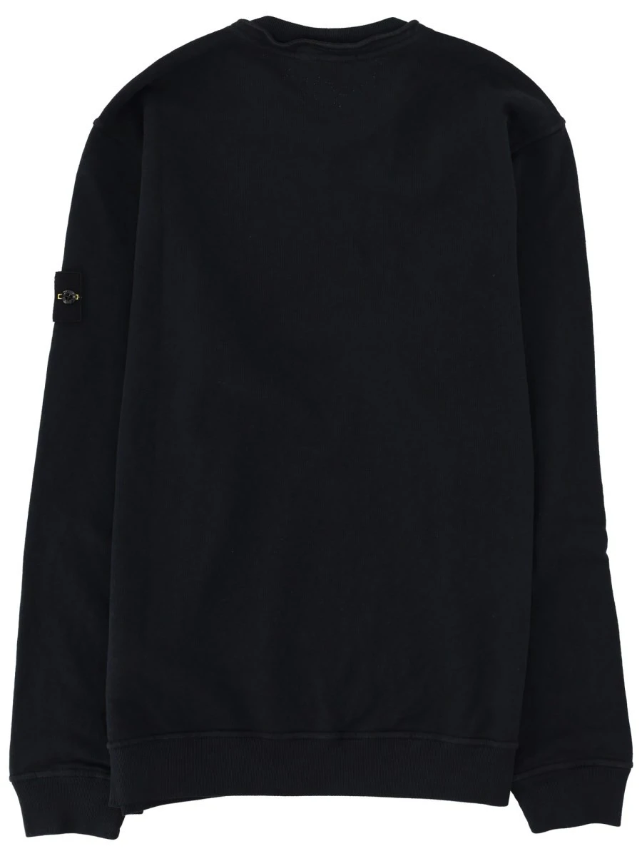 FELPA CON PATCH LOGO.webp