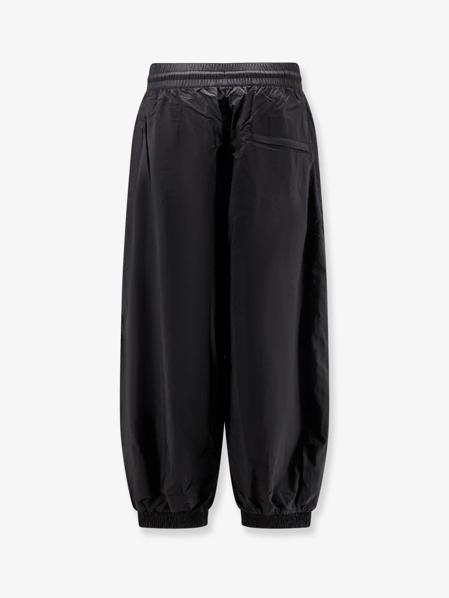 Baggy nylon trousers.webp