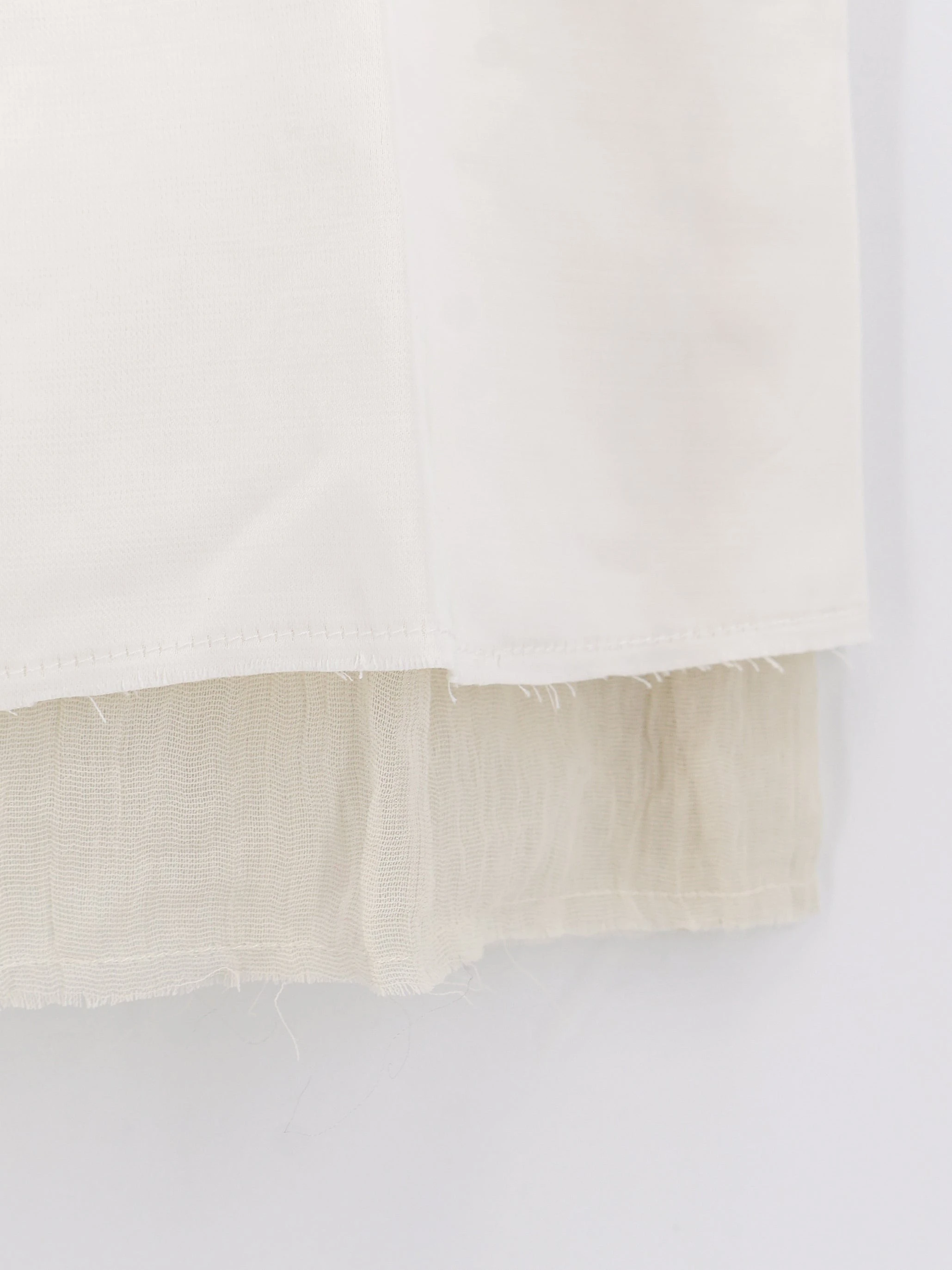 Layered viscose and linen blend skirt.webp