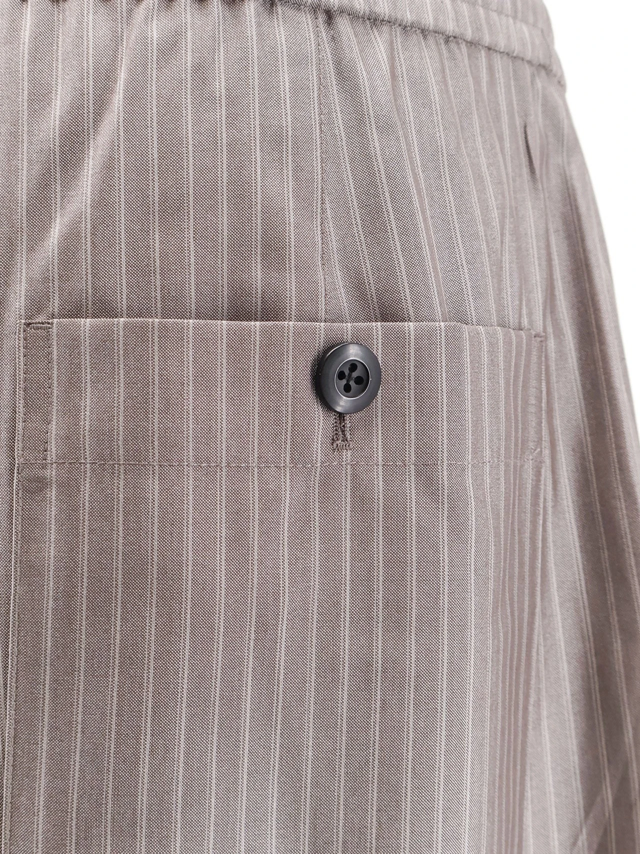 Silk, polyester and wool blend trousers.webp