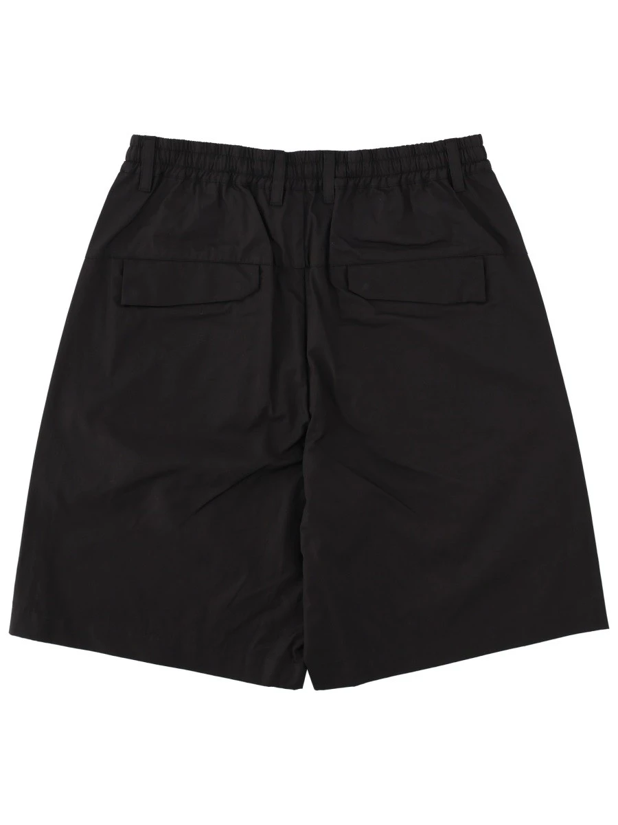 SHORTS "METROPOLIS" CON LOGO.webp