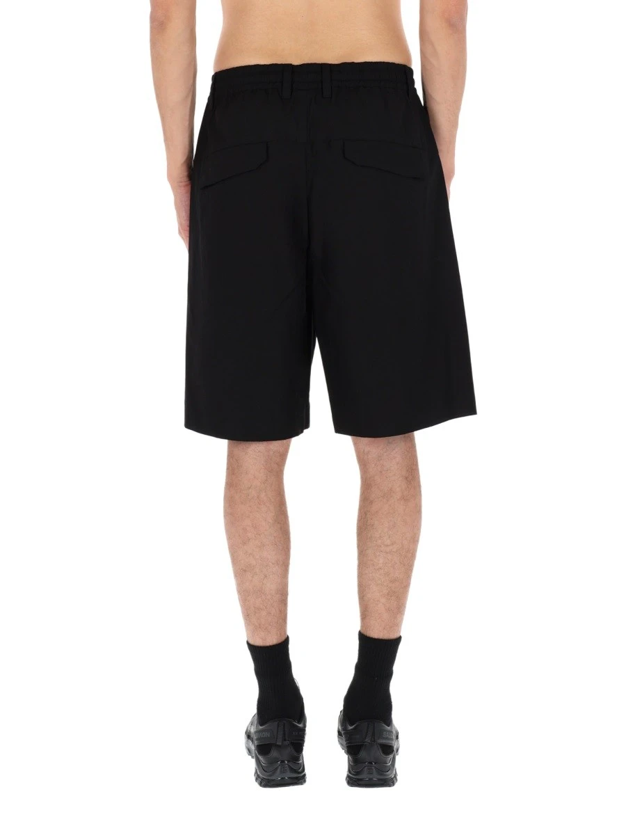 SHORTS "METROPOLIS" CON LOGO.webp