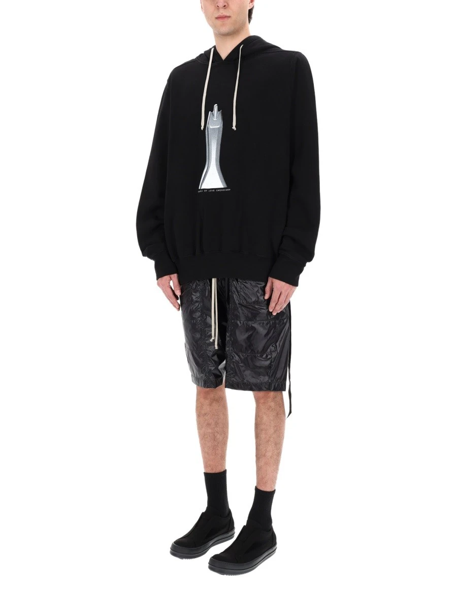 FELPA CON CAPPUCCIO OVERSIZE.webp