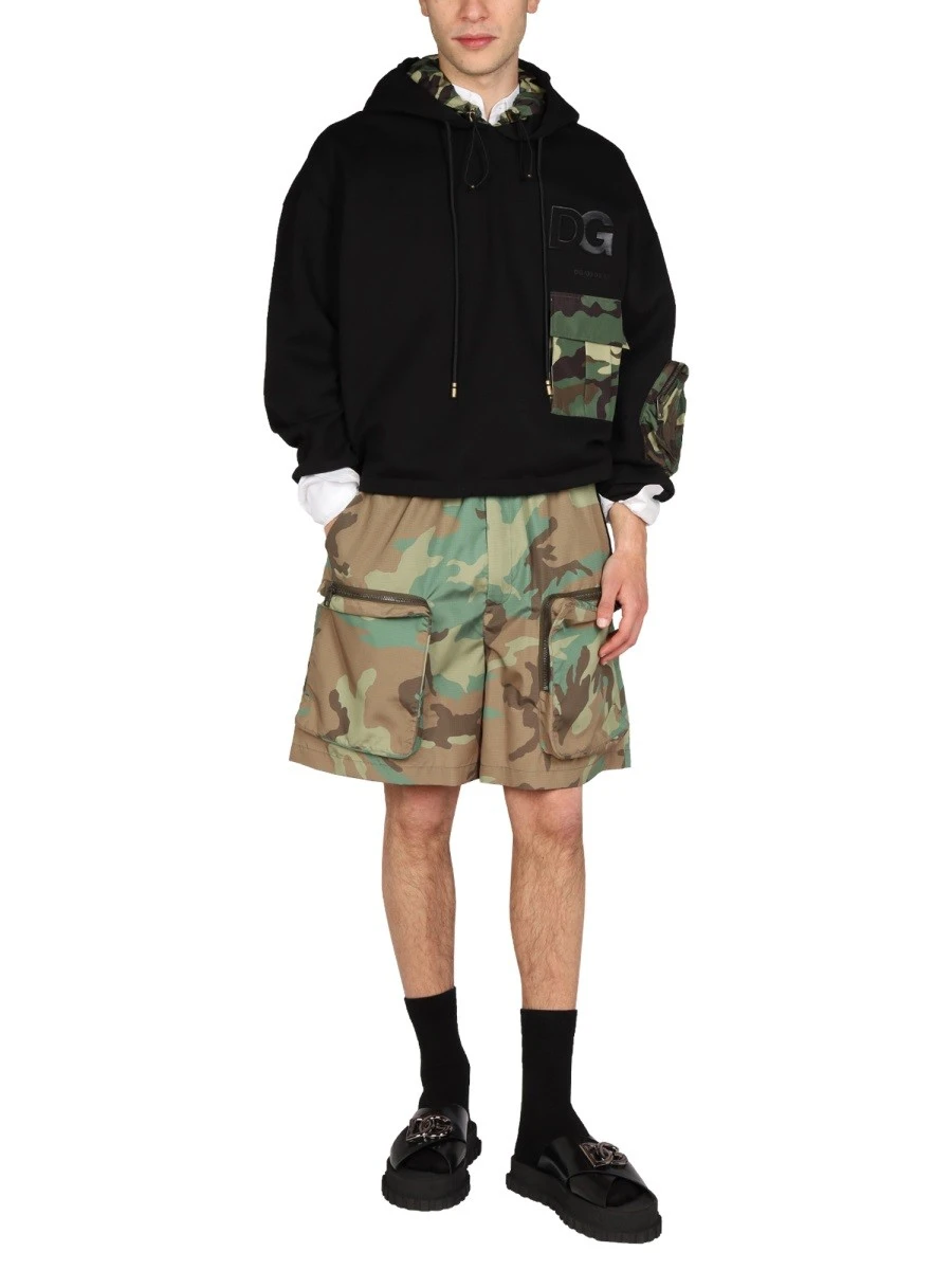 SWEATSHIRT WITH CAMO DETAILS.webp