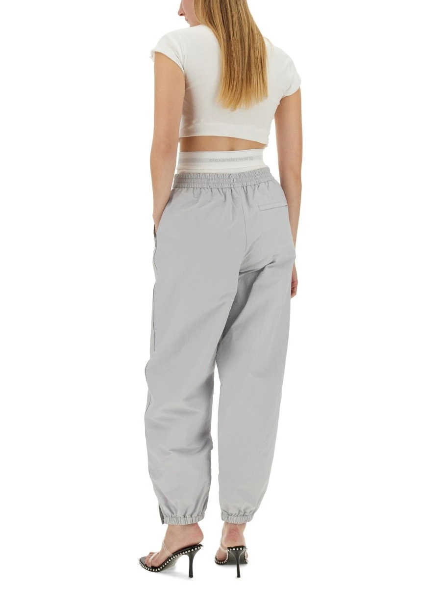 SPORTS PANTS WITH INTEGRATED UNDERWEAR.webp