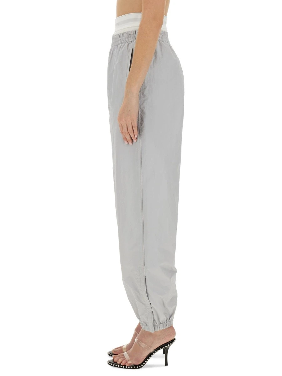 SPORTS PANTS WITH INTEGRATED UNDERWEAR.webp