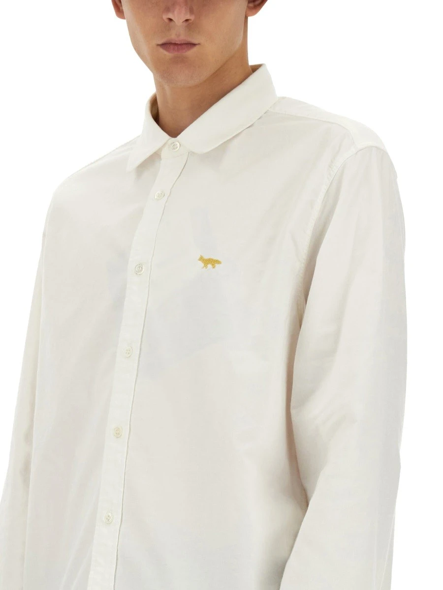 JUNYA WATANABE MAN X MAISON KITSUNE SHIRT.webp