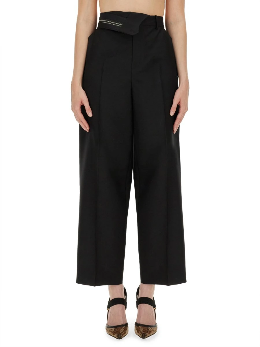 PANTS WITH ASYMMETRICAL WAIST.webp