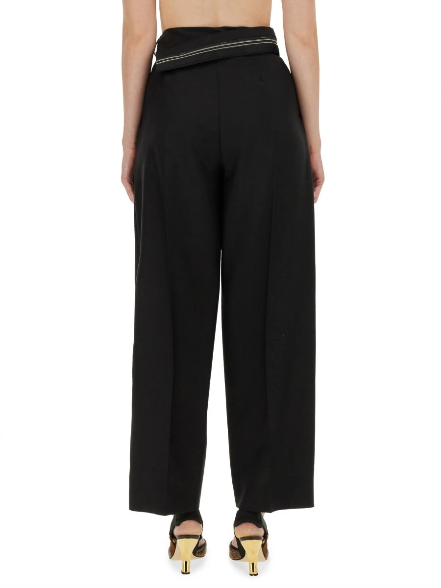 PANTS WITH ASYMMETRICAL WAIST.webp