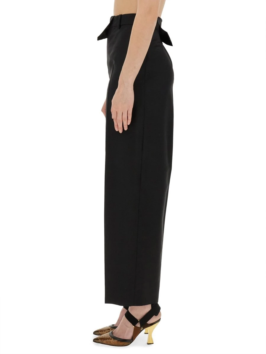 PANTS WITH ASYMMETRICAL WAIST.webp