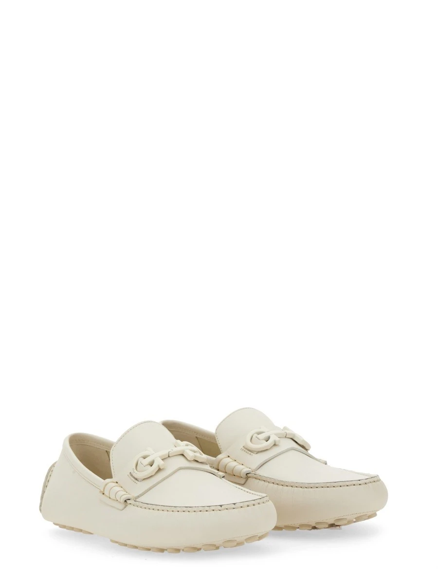 MOCCASIN WITH GANCINI ORNAMENT.webp