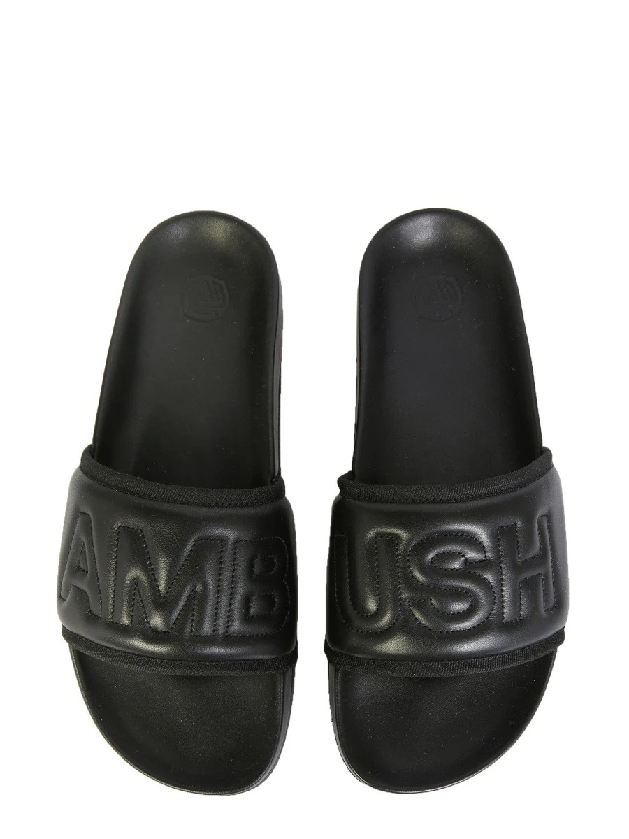 LEATHER SLIDE SANDALS.webp