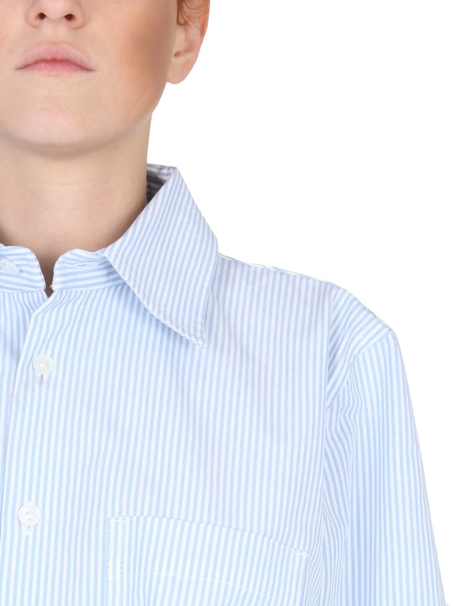 SHIRT WITH CURVED BACK.webp