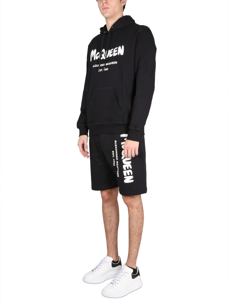 BERMUDA SHORTS WITH GRAFFITI LOGO PRINT.webp