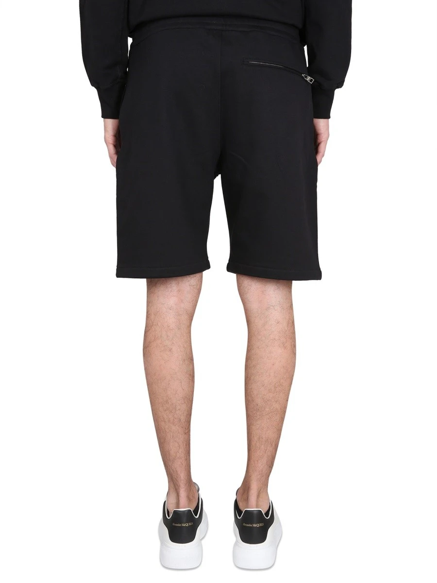 BERMUDA SHORTS WITH GRAFFITI LOGO PRINT.webp