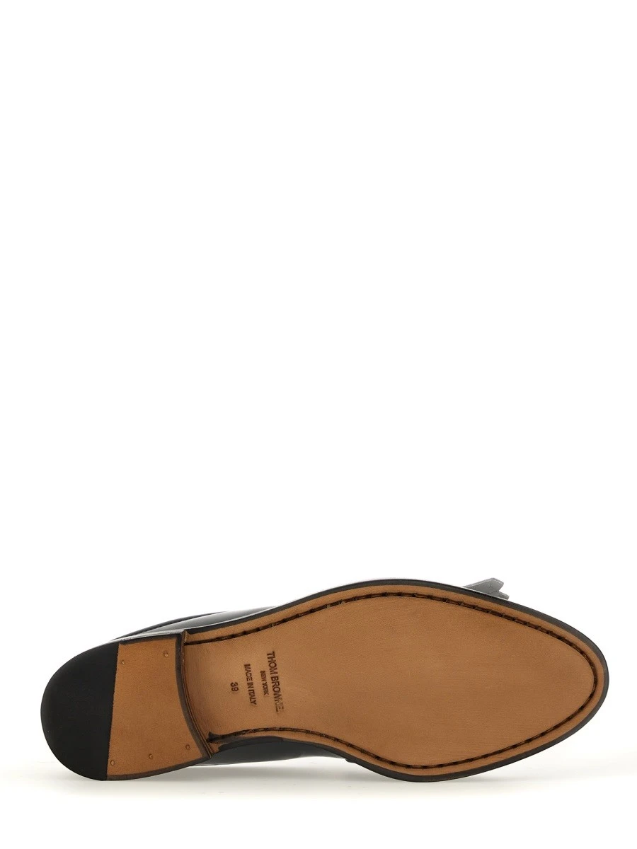 KILT VARSITY PENNY LOAFER.webp