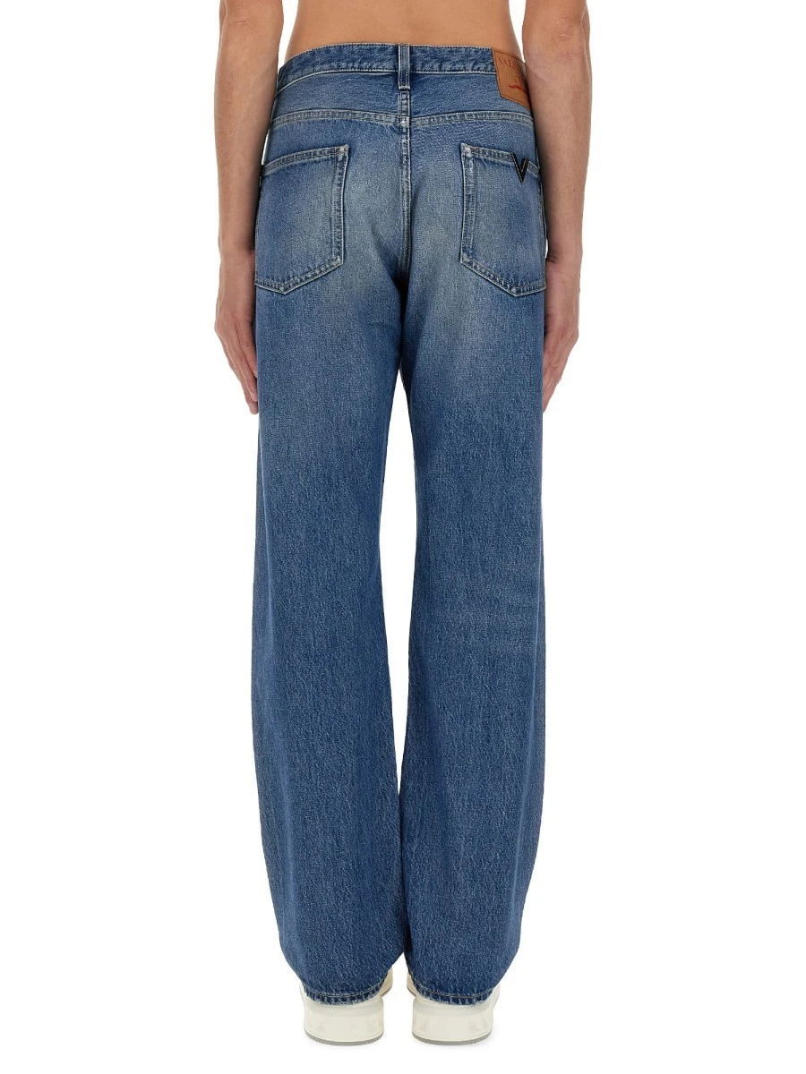 JEANS WITH LOGO DETAIL.webp
