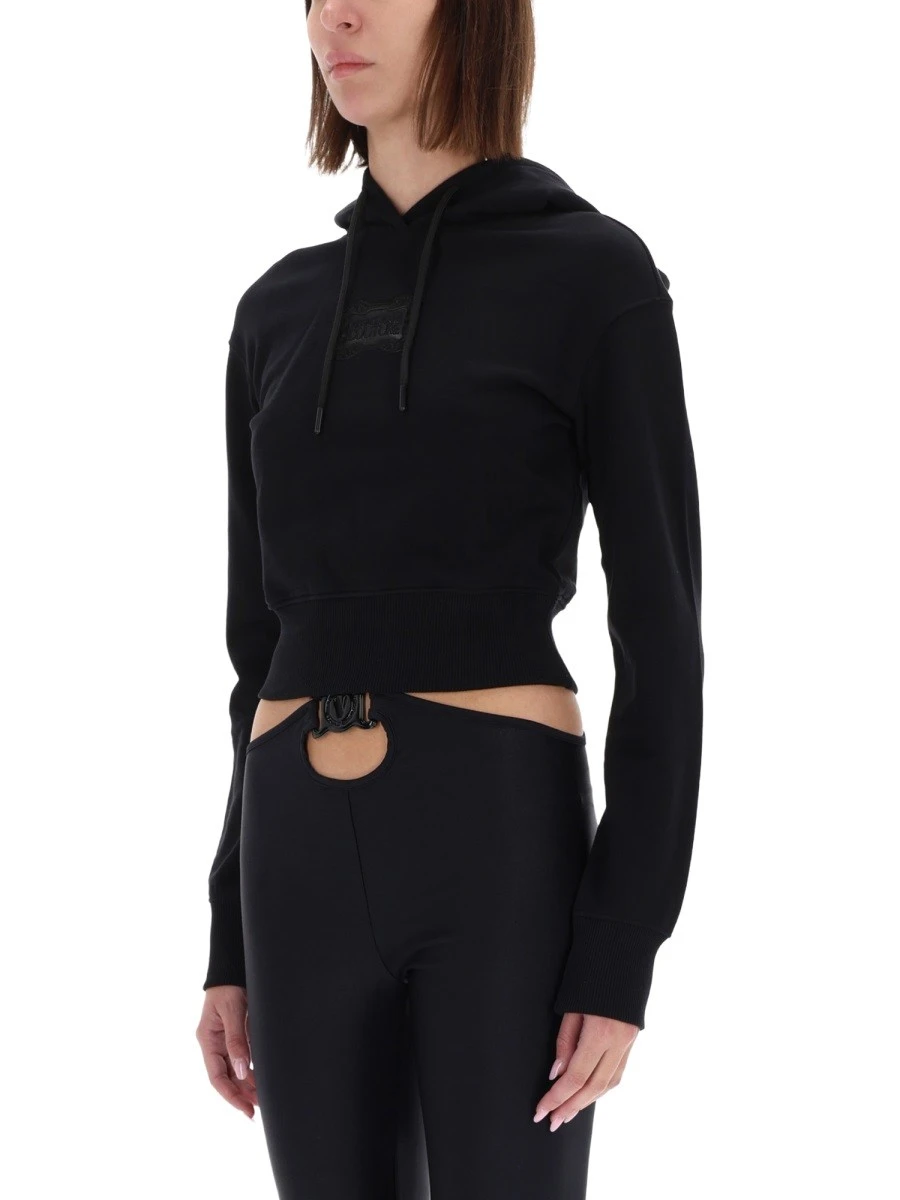 CROPPED SWEATSHIRT WITH "BAROQUE" LOGO PATCH.webp