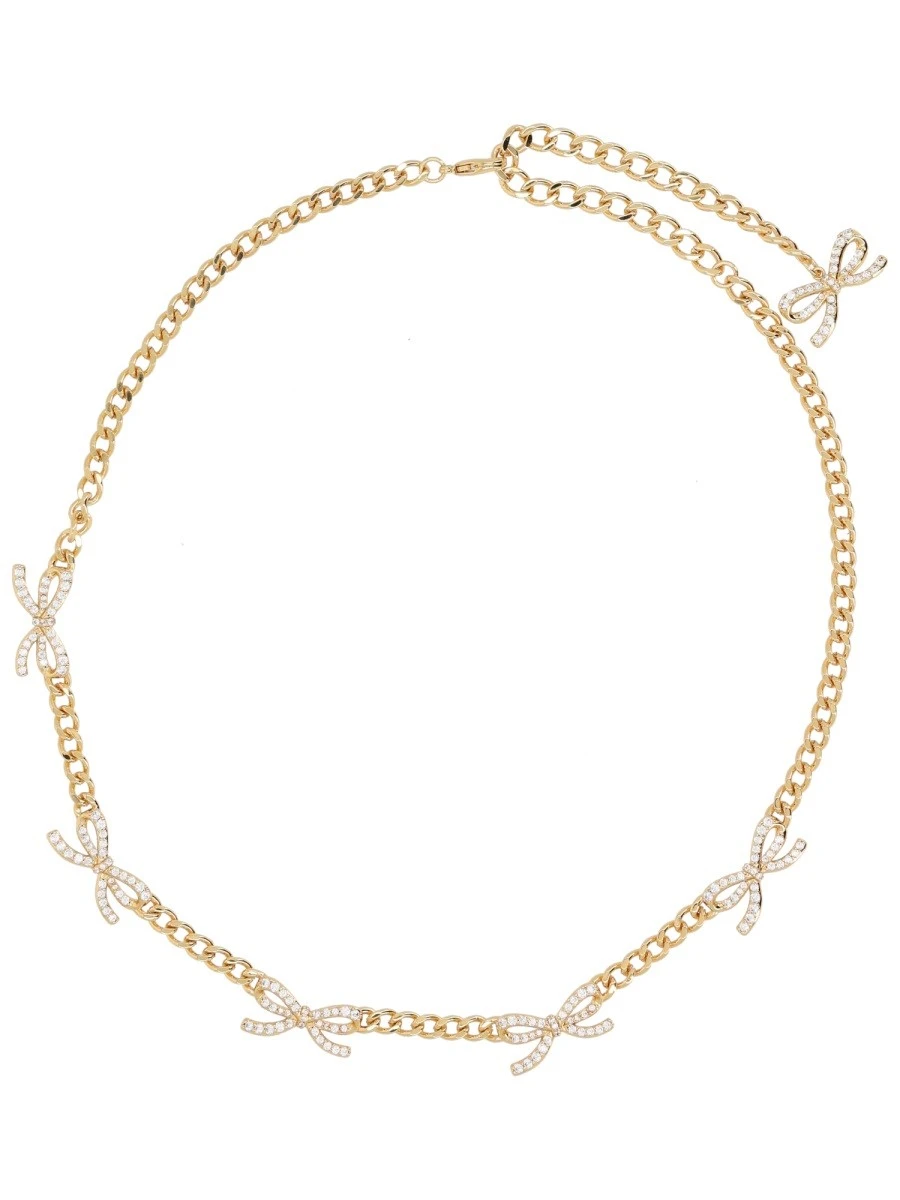 NECKLACE WITH BOWS AND CRYSTALS.webp