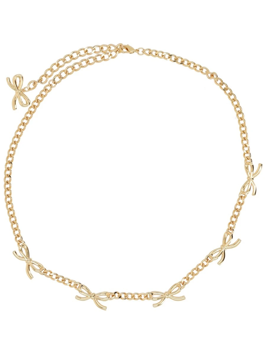 NECKLACE WITH BOWS AND CRYSTALS.webp