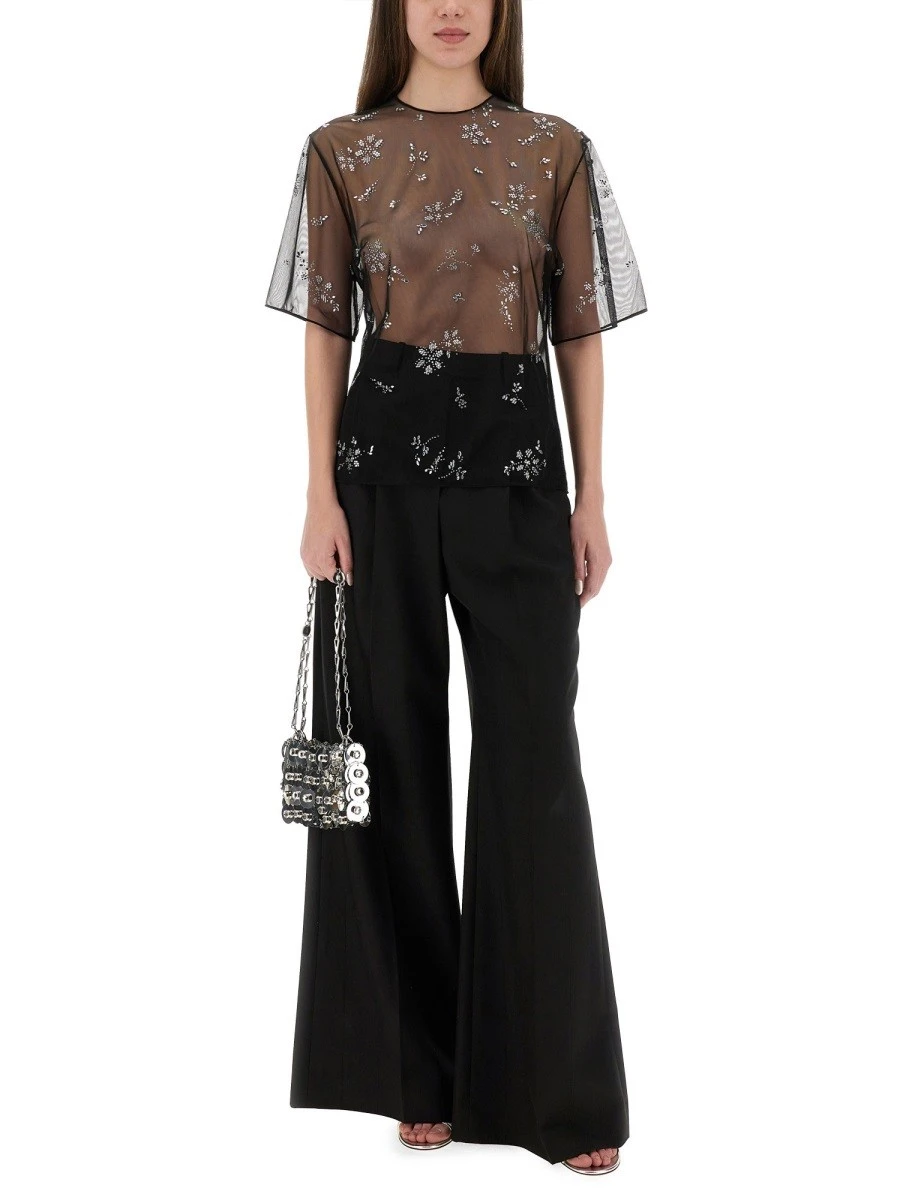 TRANSPARENT TOP WITH APPLICATIONS.webp