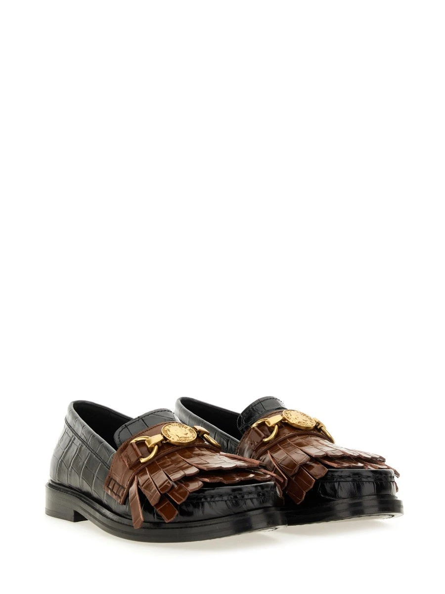 MOCCASIN WITH BANGS AND COIN.webp