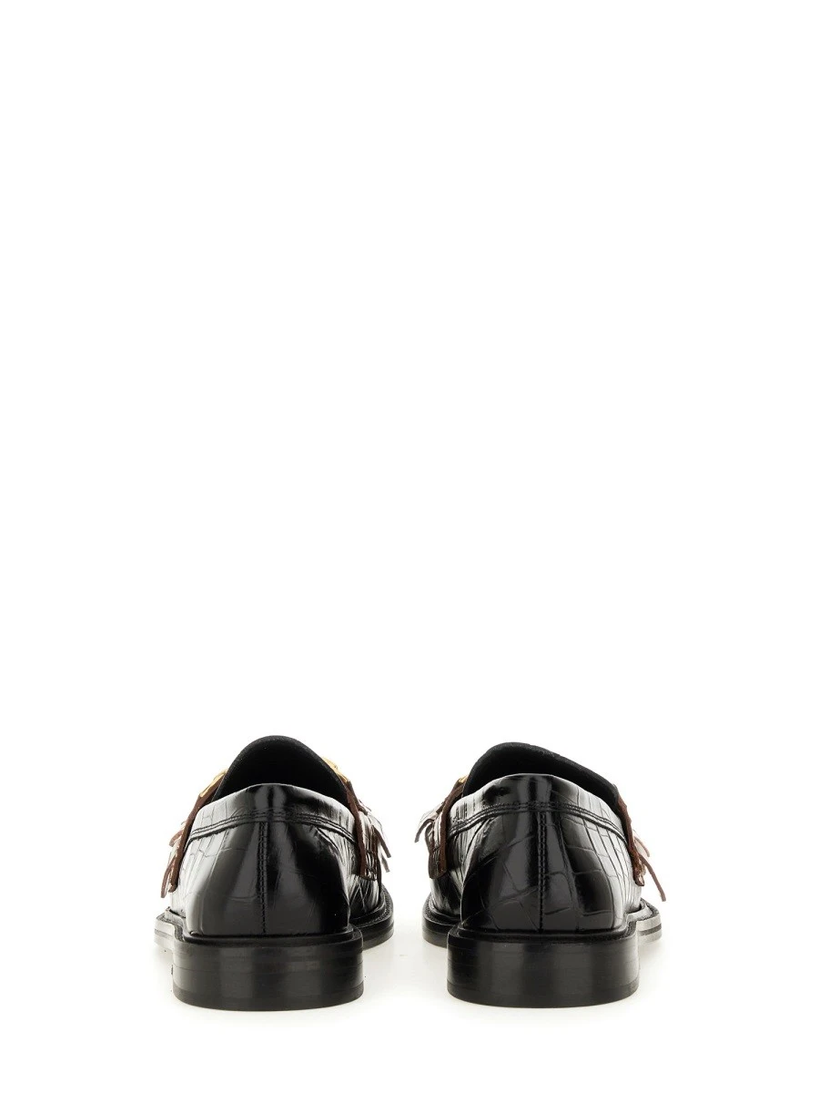 MOCCASIN WITH BANGS AND COIN.webp
