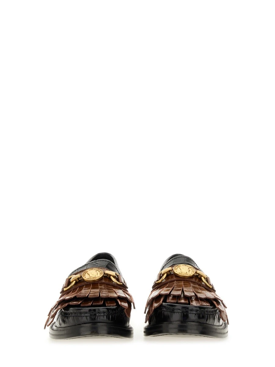 MOCCASIN WITH BANGS AND COIN.webp