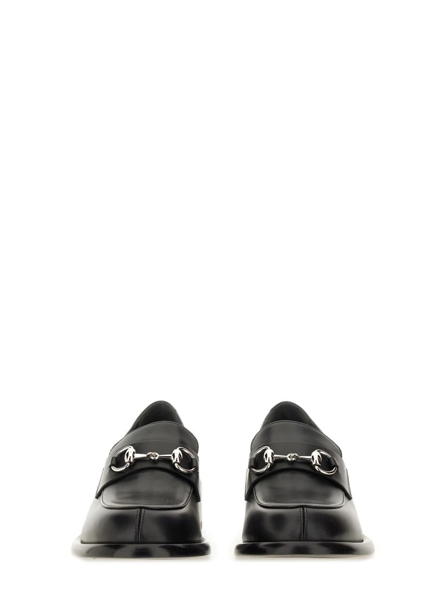 MOCCASIN WITH CLAMP.webp