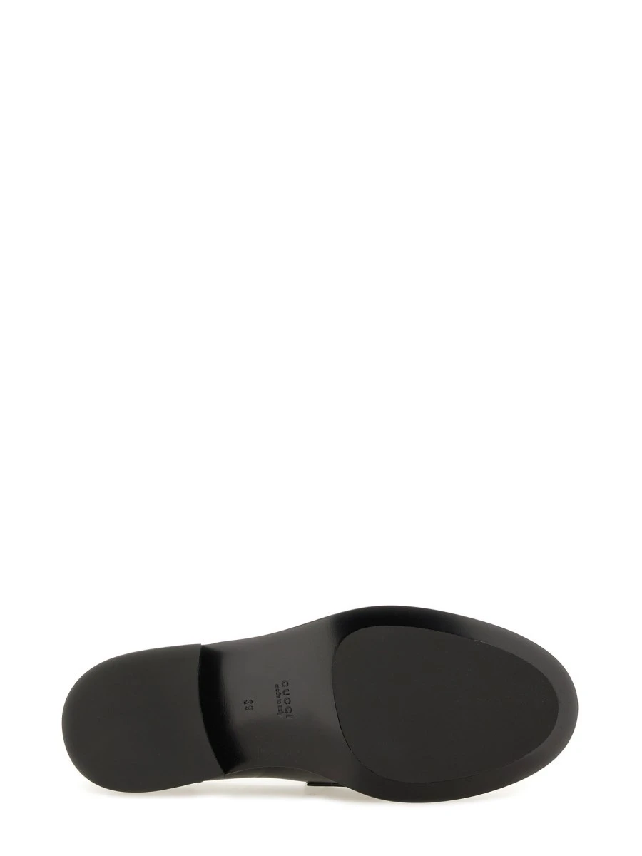 MOCCASIN WITH CLAMP.webp