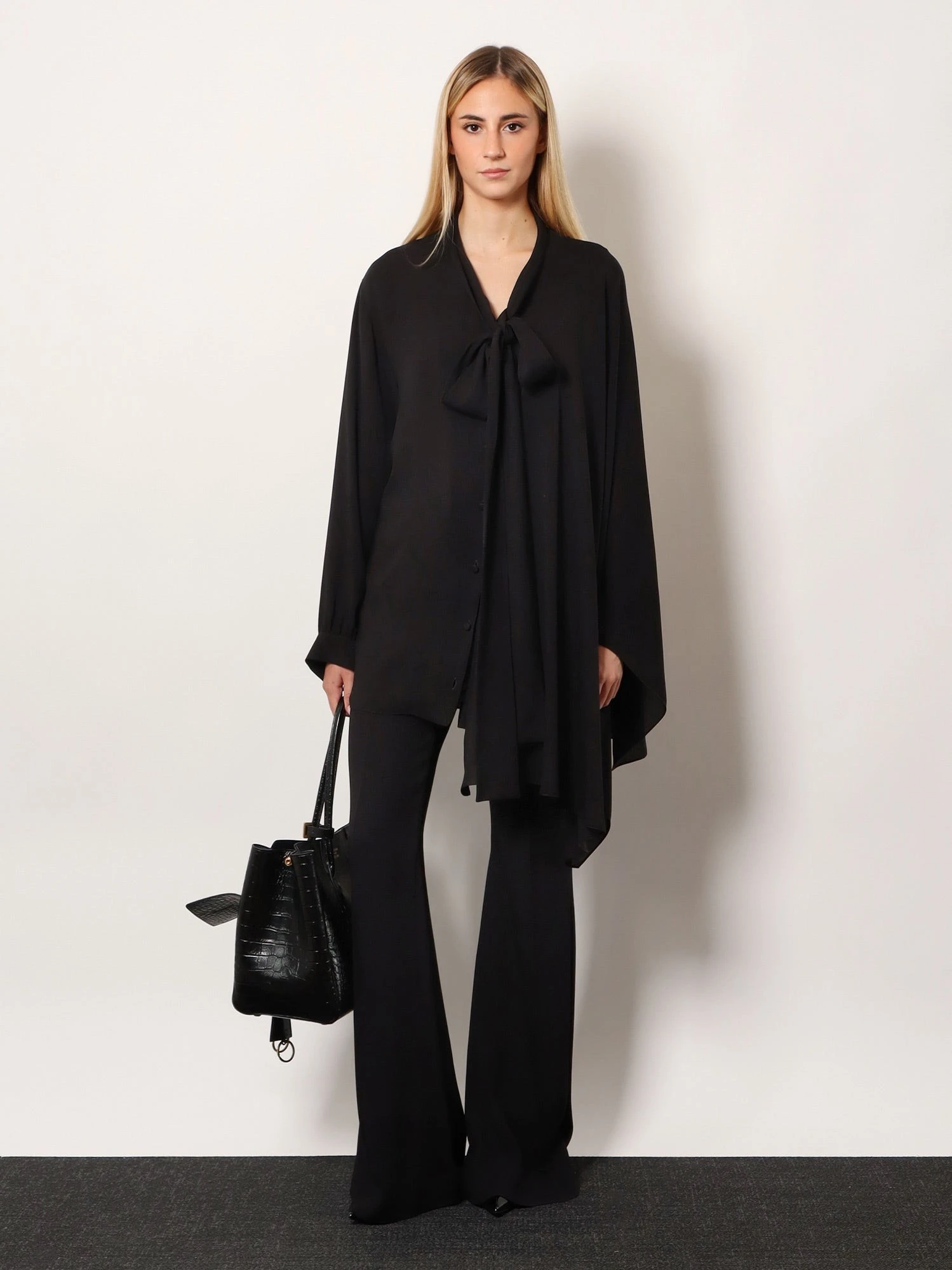 Viscose trousers with flared bottom.webp