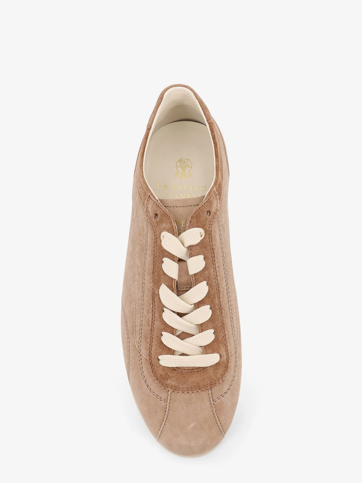 Leather sneakers with stitching detail.webp