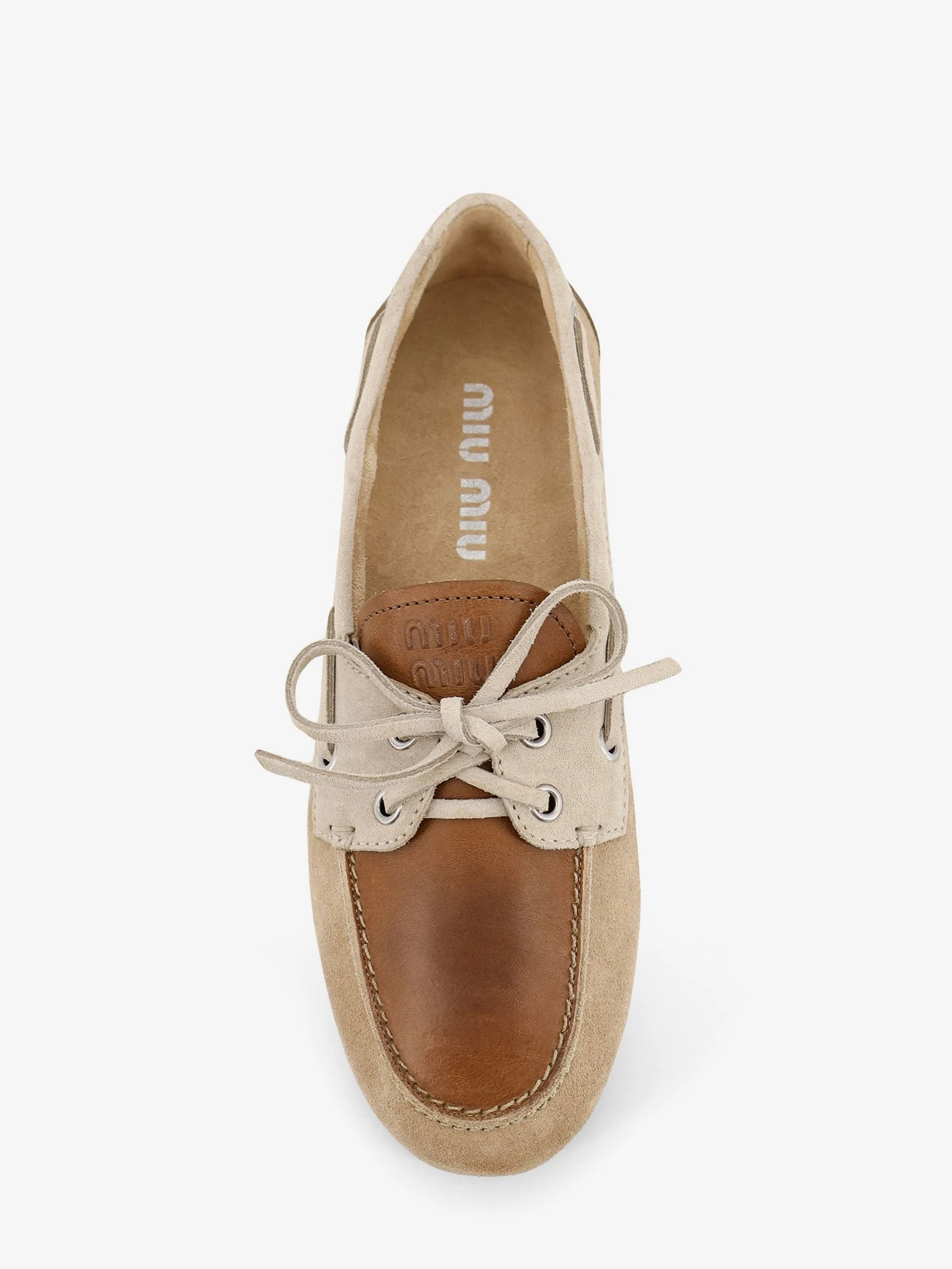 Suede loafer with leather inserts.webp