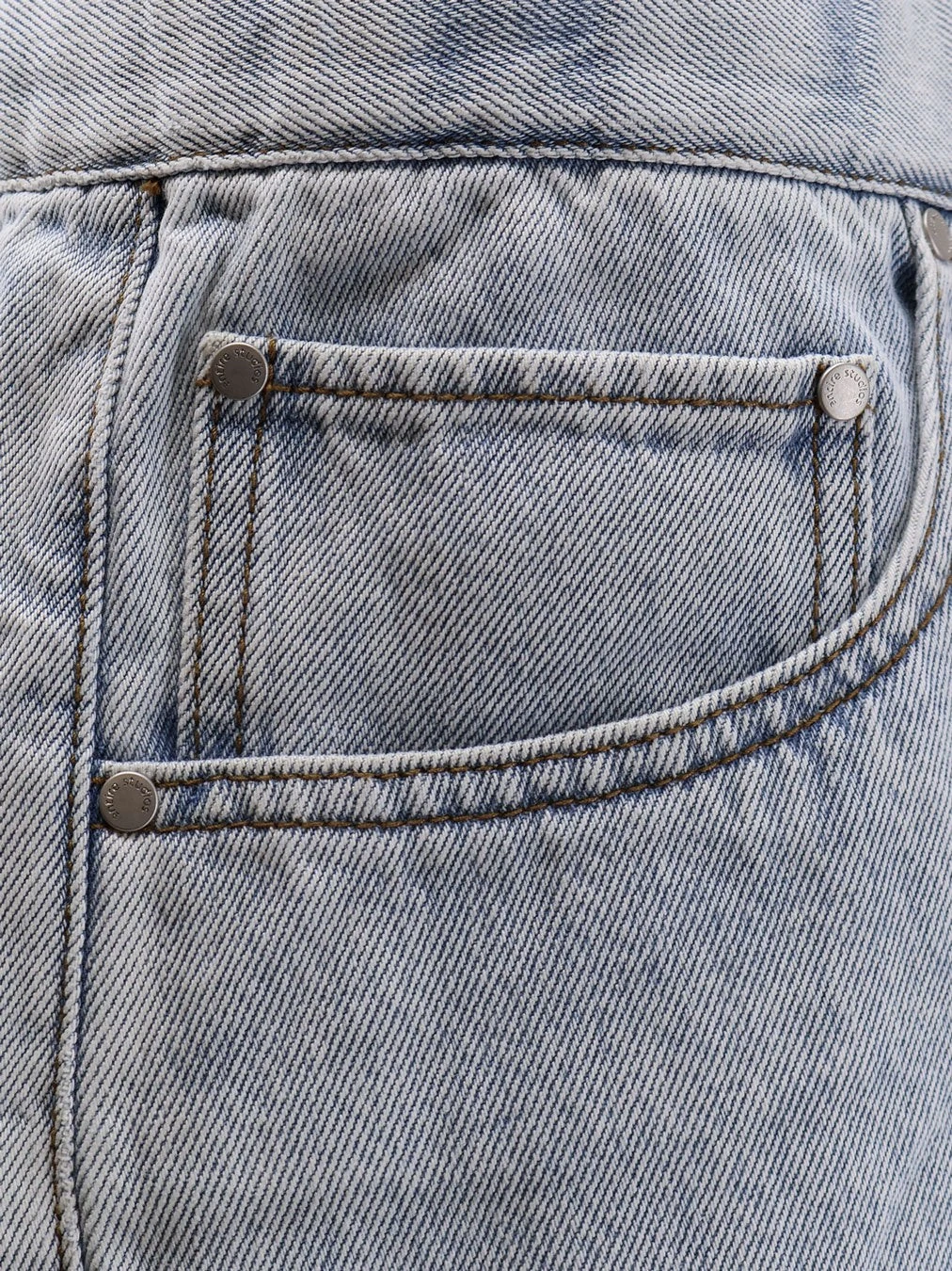Light-washed denim bermuda shorts.webp