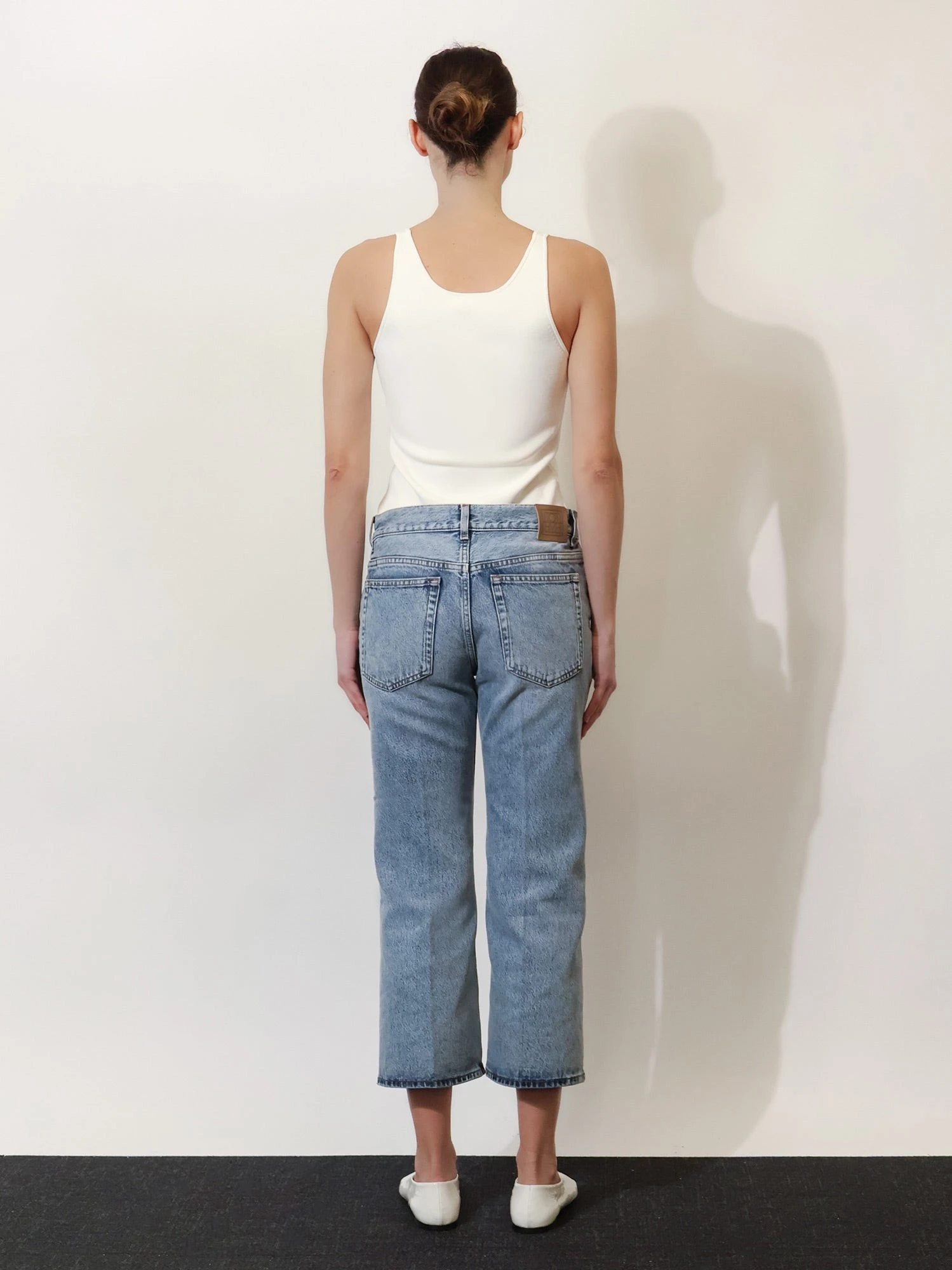 Cotton jeans with flared bottom.webp