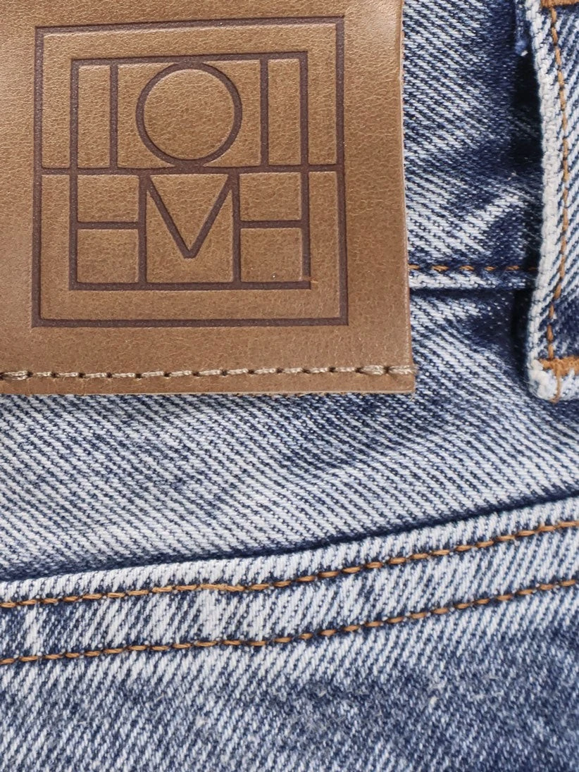 Cotton jeans with flared bottom.webp